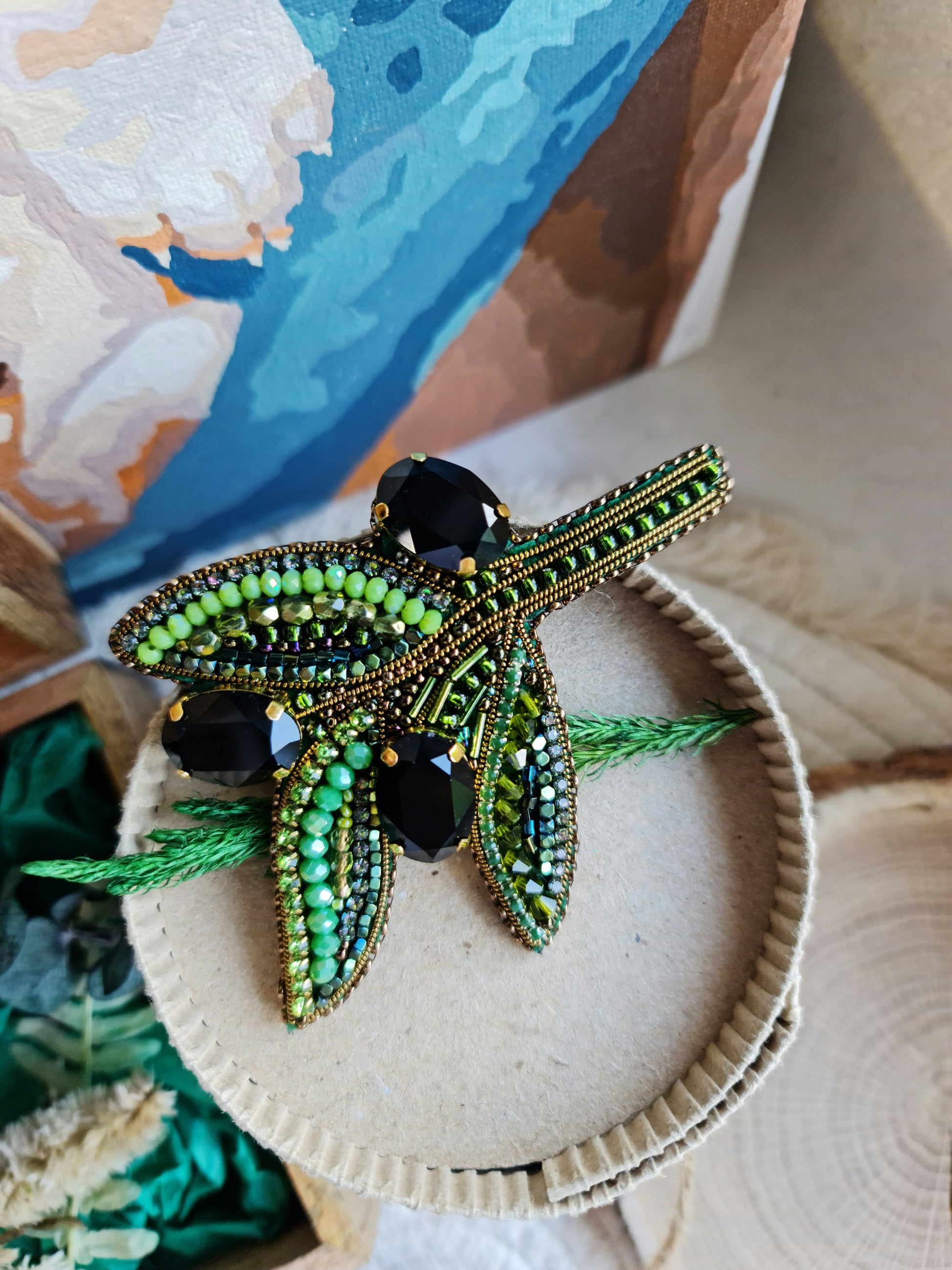 Olive branch beaded brooch hand embroidered with green beads black crystals and leaf details