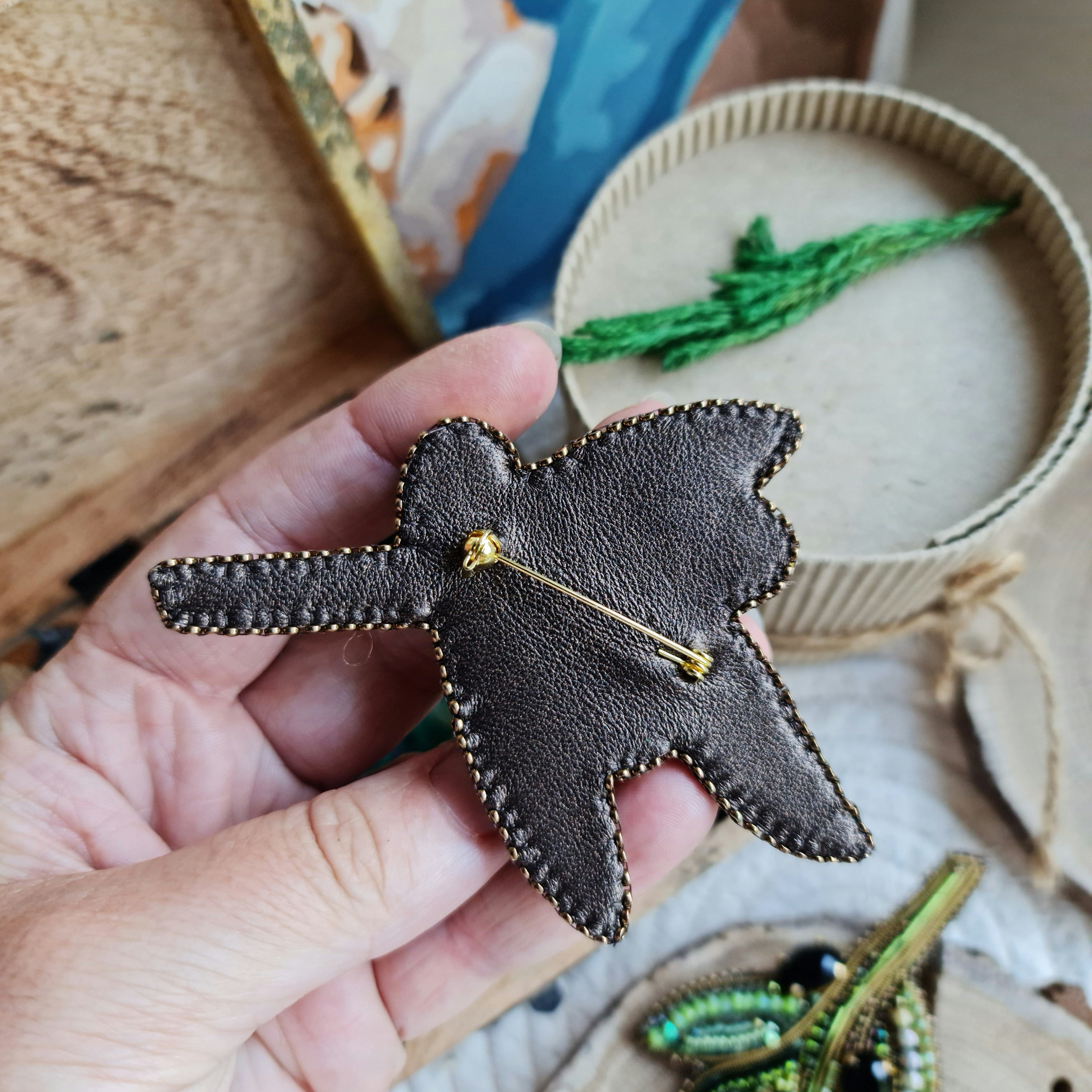 Olive branch beaded brooch hand embroidered with green beads black crystals and leaf details