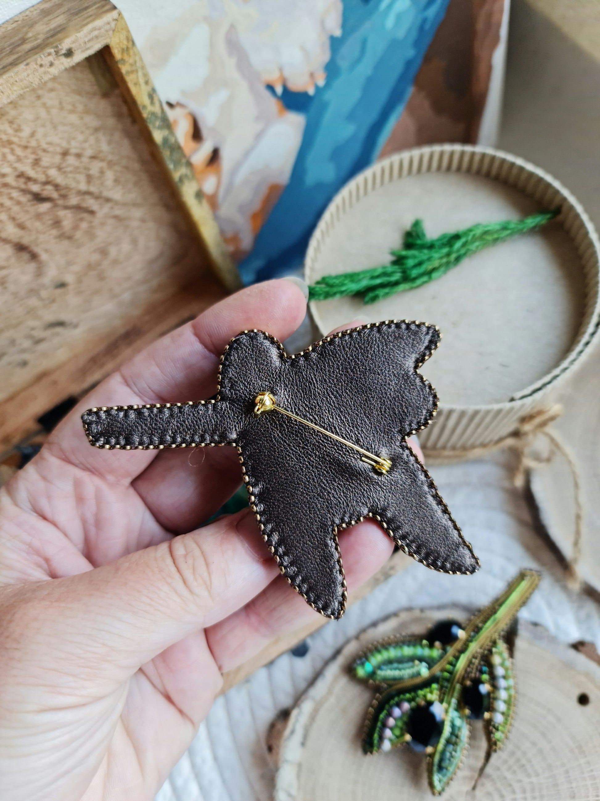 Olive branch beaded brooch hand embroidered with green beads black crystals and leaf details