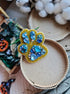 Pet paw beaded brooch hand embroidered with gold beads blue crystals and sparkling rhinestone details