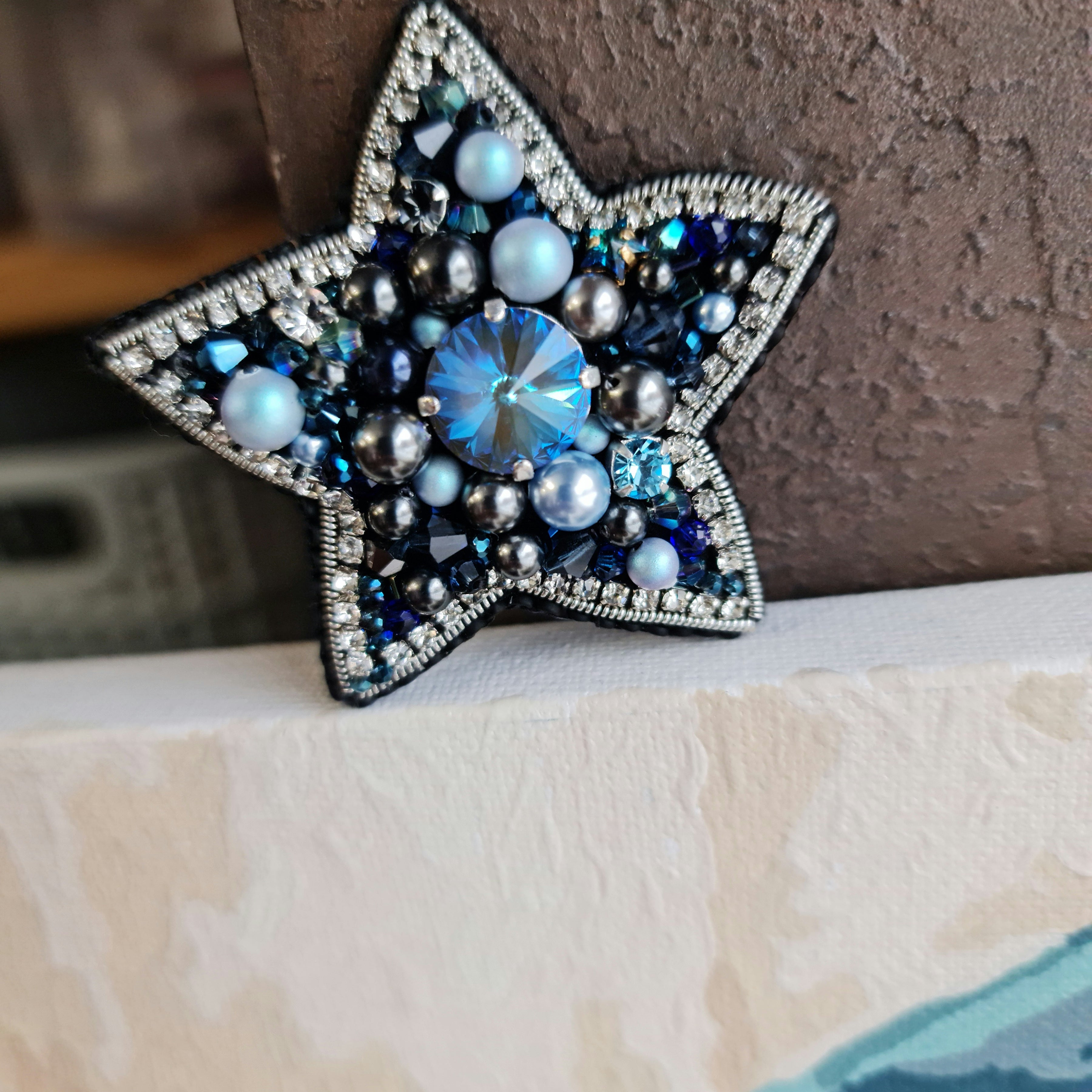 Blue star beaded brooch hand embroidered with crystals pearls and silver details