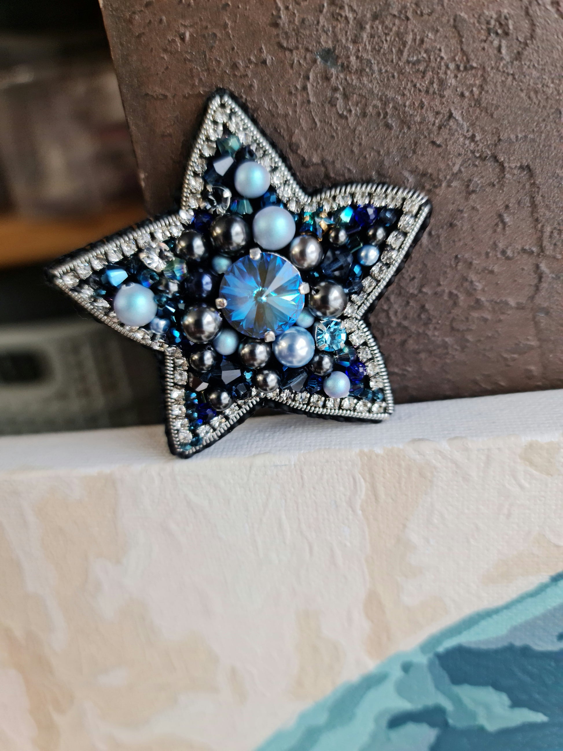 Blue star beaded brooch hand embroidered with crystals pearls and silver details
