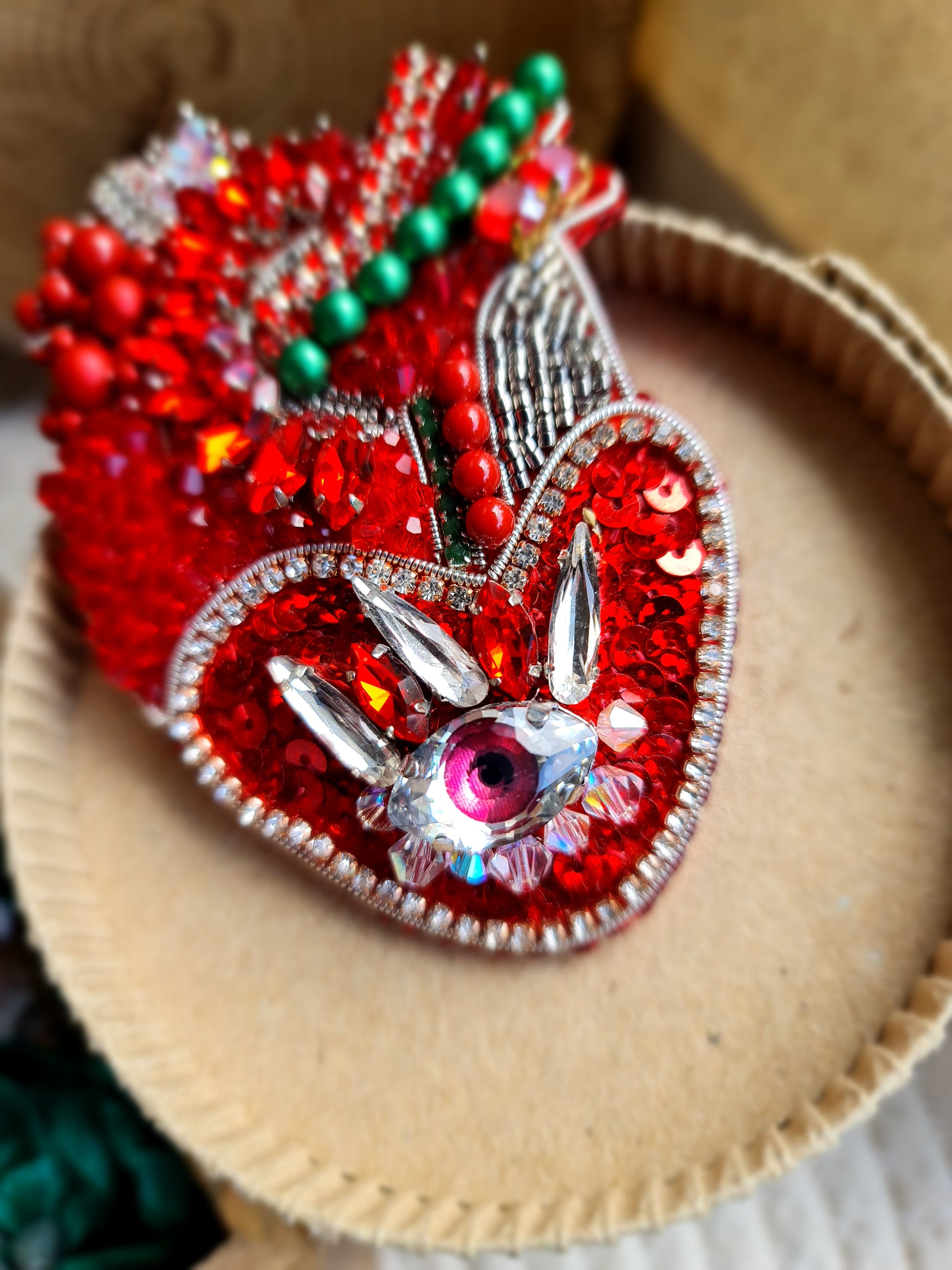 Red anatomical heart brooch with pink eye, hand embroidered with beads and crystals