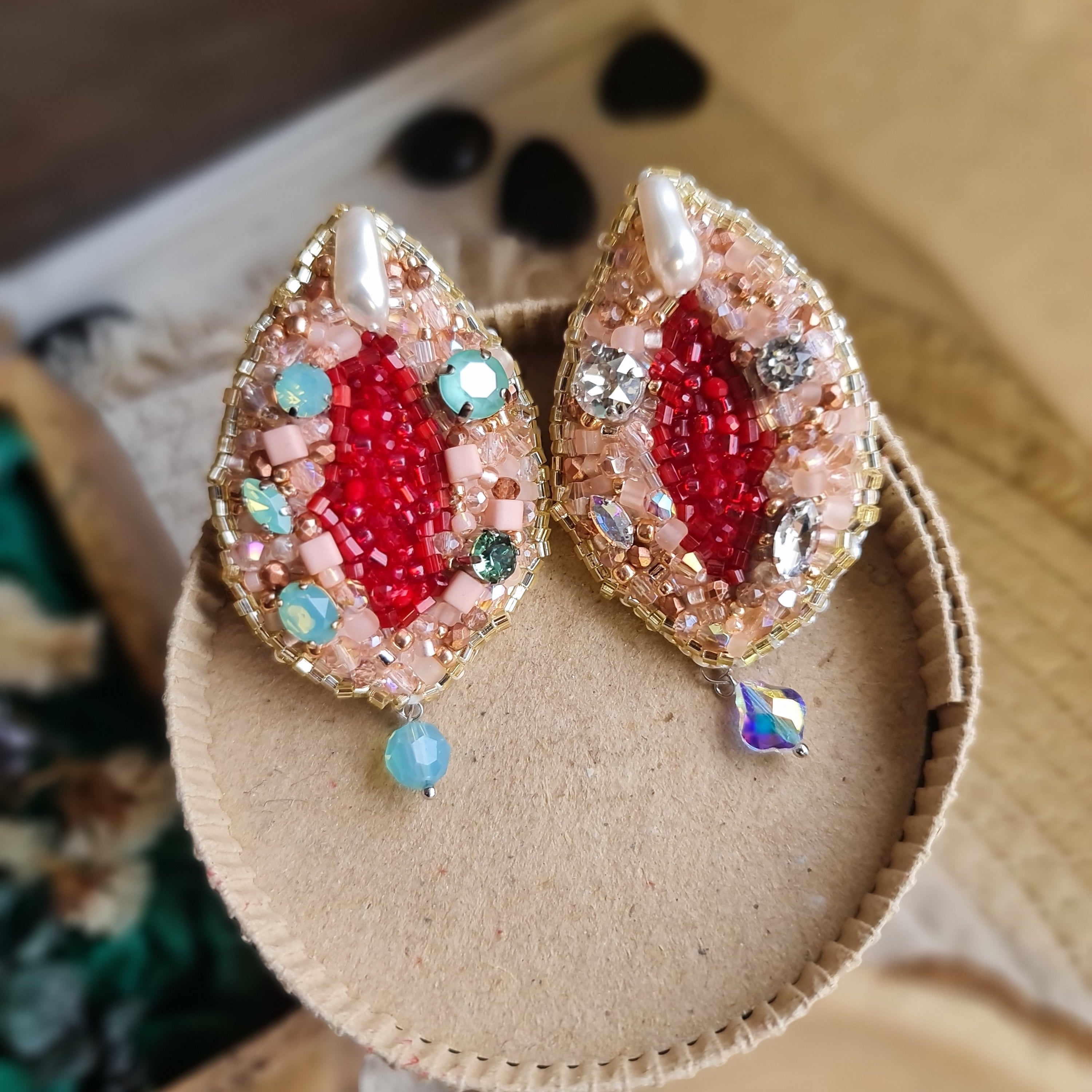 Vulva art beaded brooch hand embroidered with pink beads, pearls, crystals, and sparkling feminist jewelry details