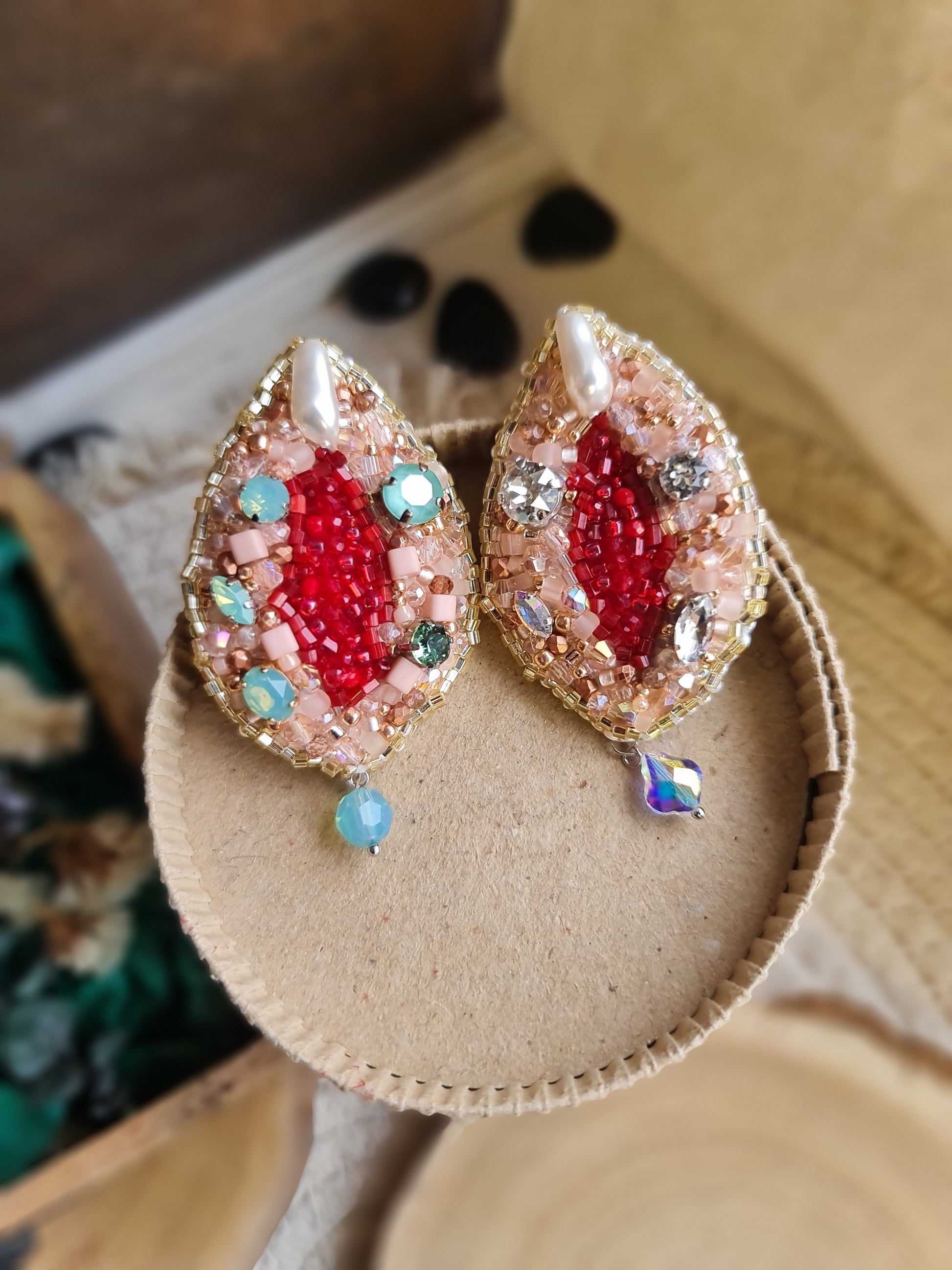 Vulva art beaded brooch hand embroidered with pink beads, pearls, crystals, and sparkling feminist jewelry details