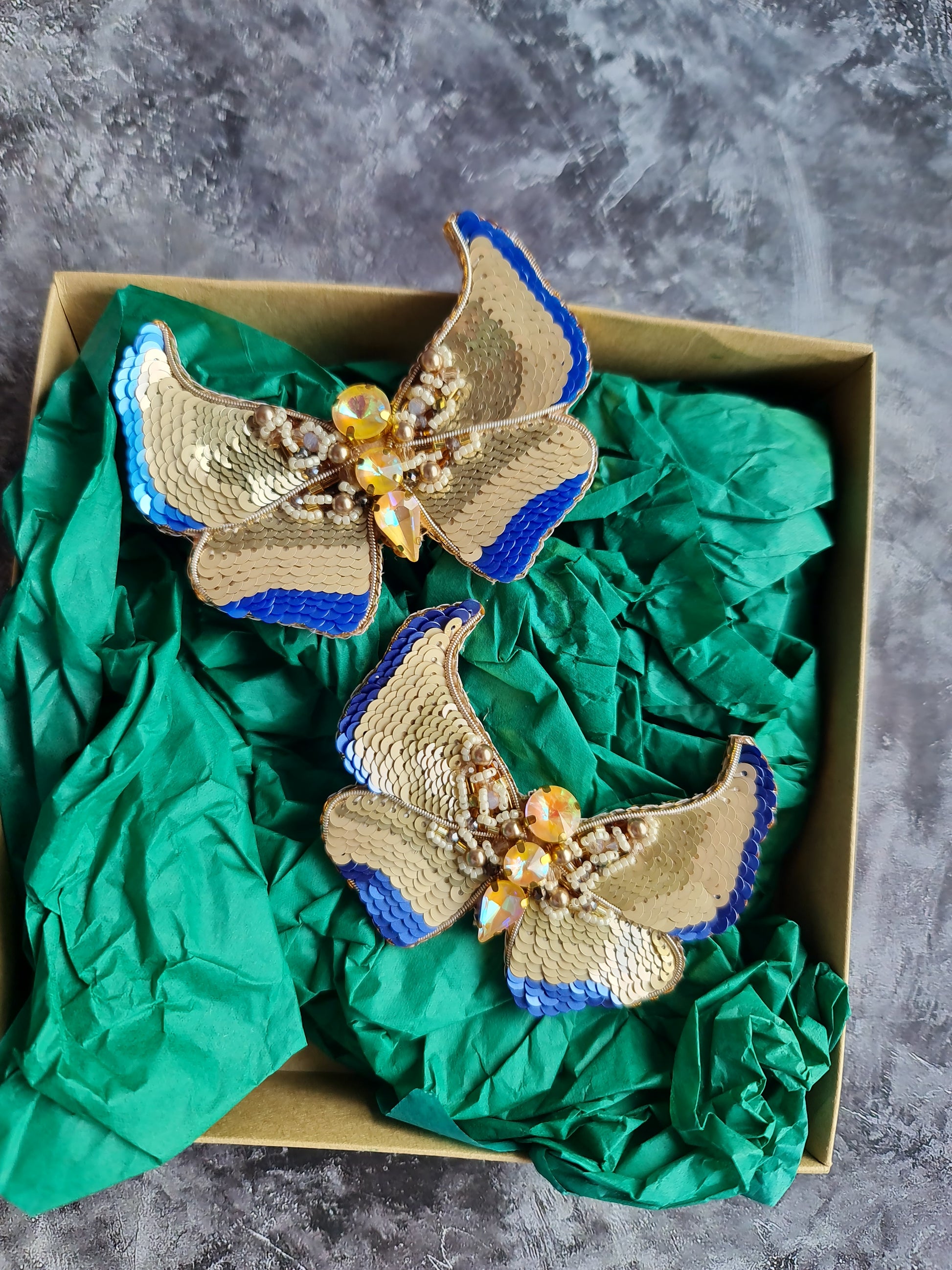 Gold butterfly beaded brooch hand embroidered with cream sequins blue accents crystals and pearl details