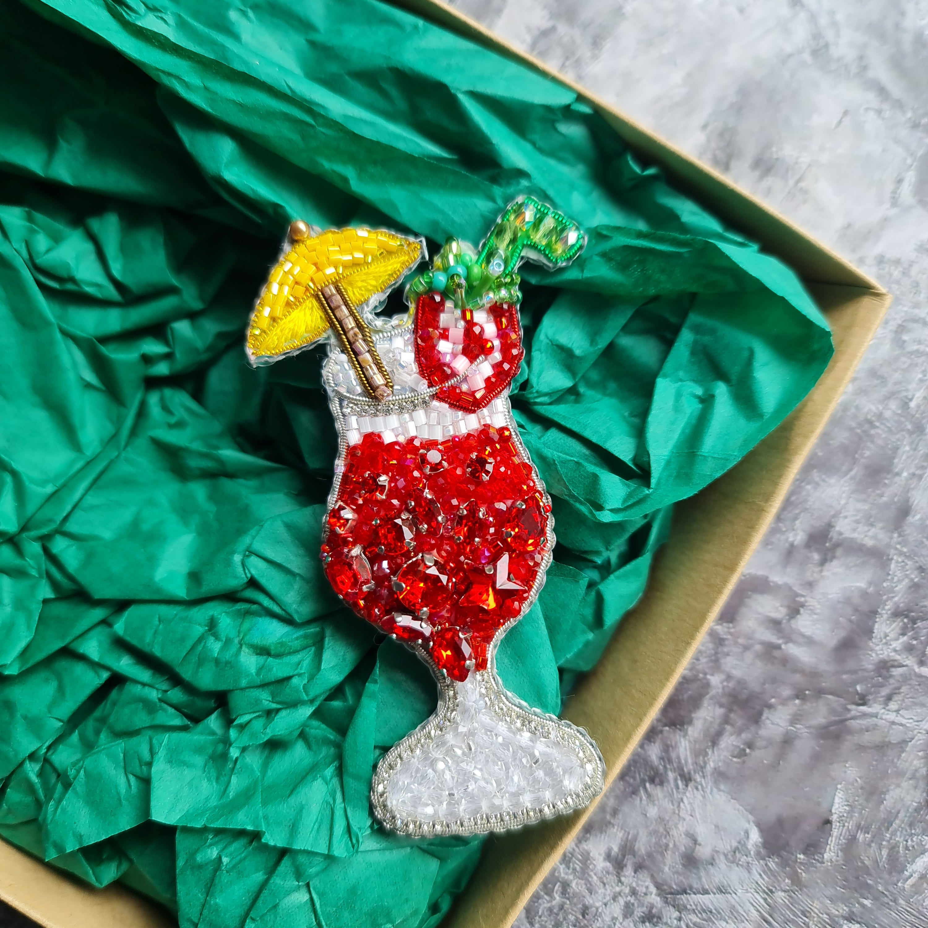 Tropical red cocktail beaded brooch hand embroidered with yellow umbrella fruit garnish and crystal details