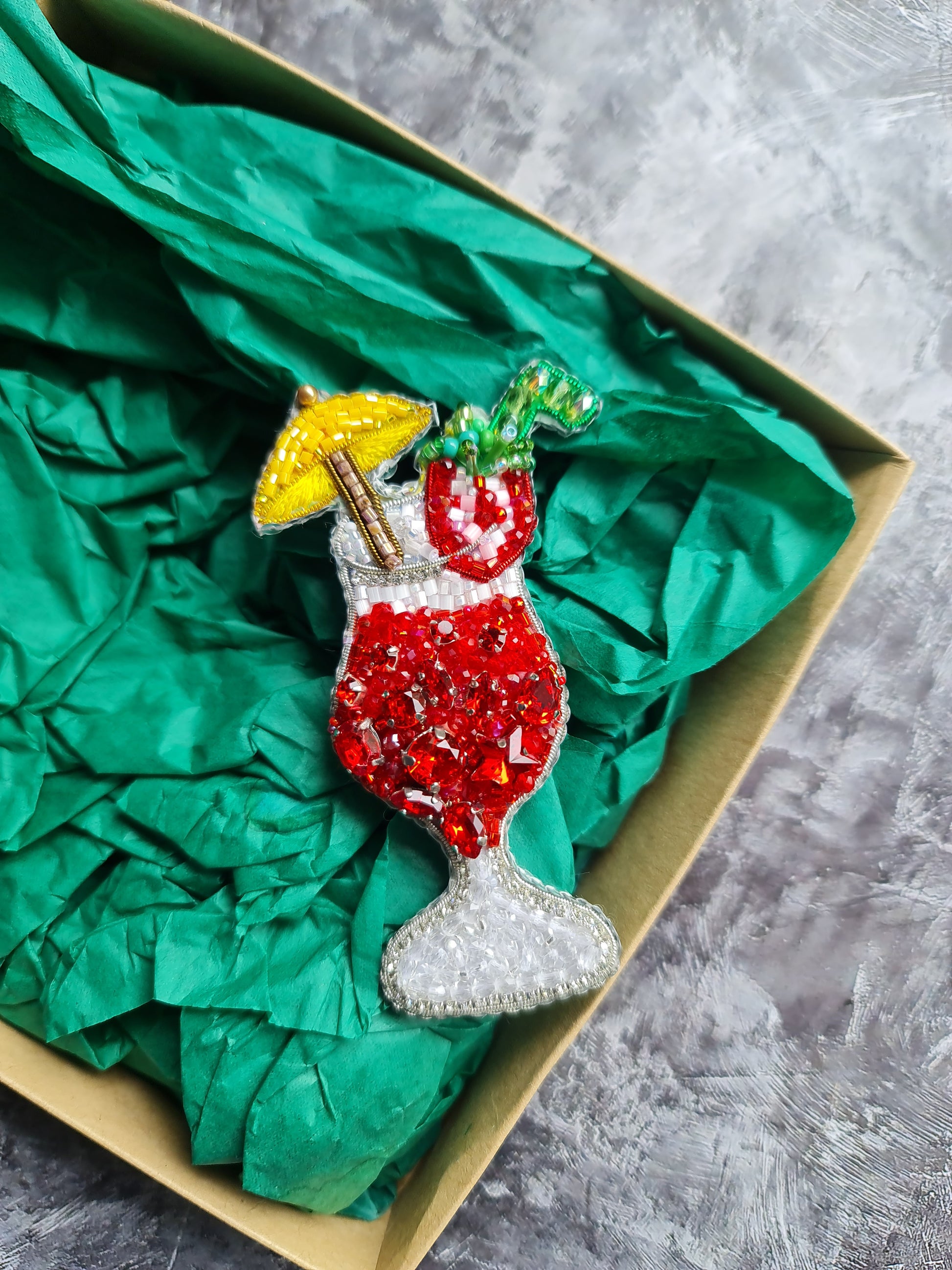 Tropical red cocktail beaded brooch hand embroidered with yellow umbrella fruit garnish and crystal details