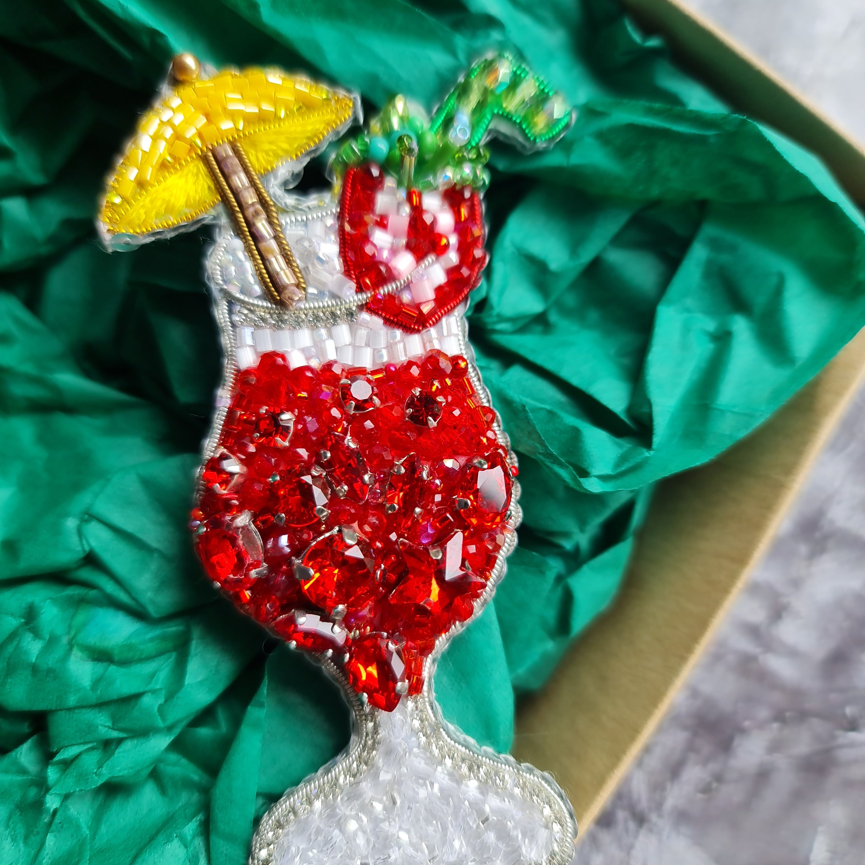 Tropical red cocktail beaded brooch hand embroidered with yellow umbrella fruit garnish and crystal details