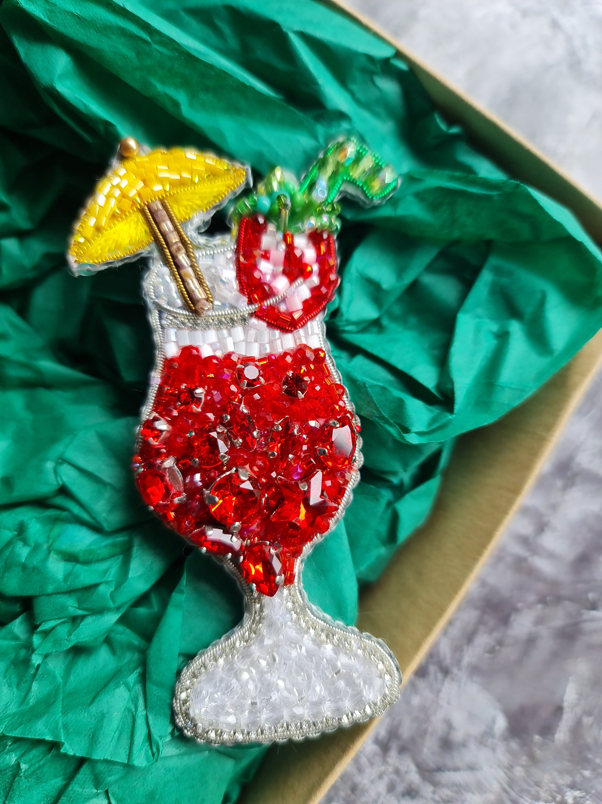 Tropical red cocktail beaded brooch hand embroidered with yellow umbrella fruit garnish and crystal details