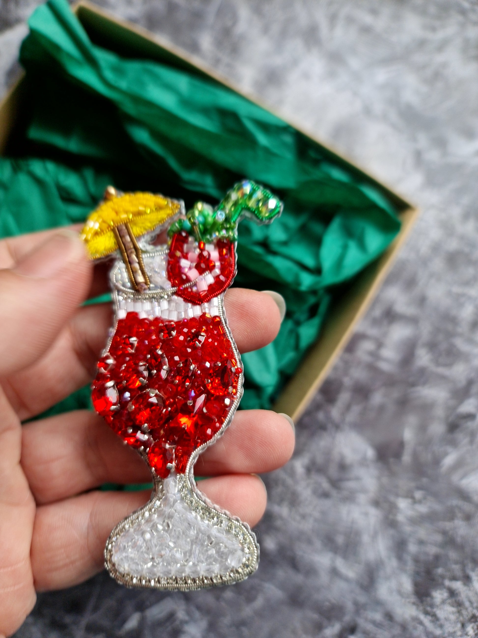 Tropical red cocktail beaded brooch hand embroidered with yellow umbrella fruit garnish and crystal details