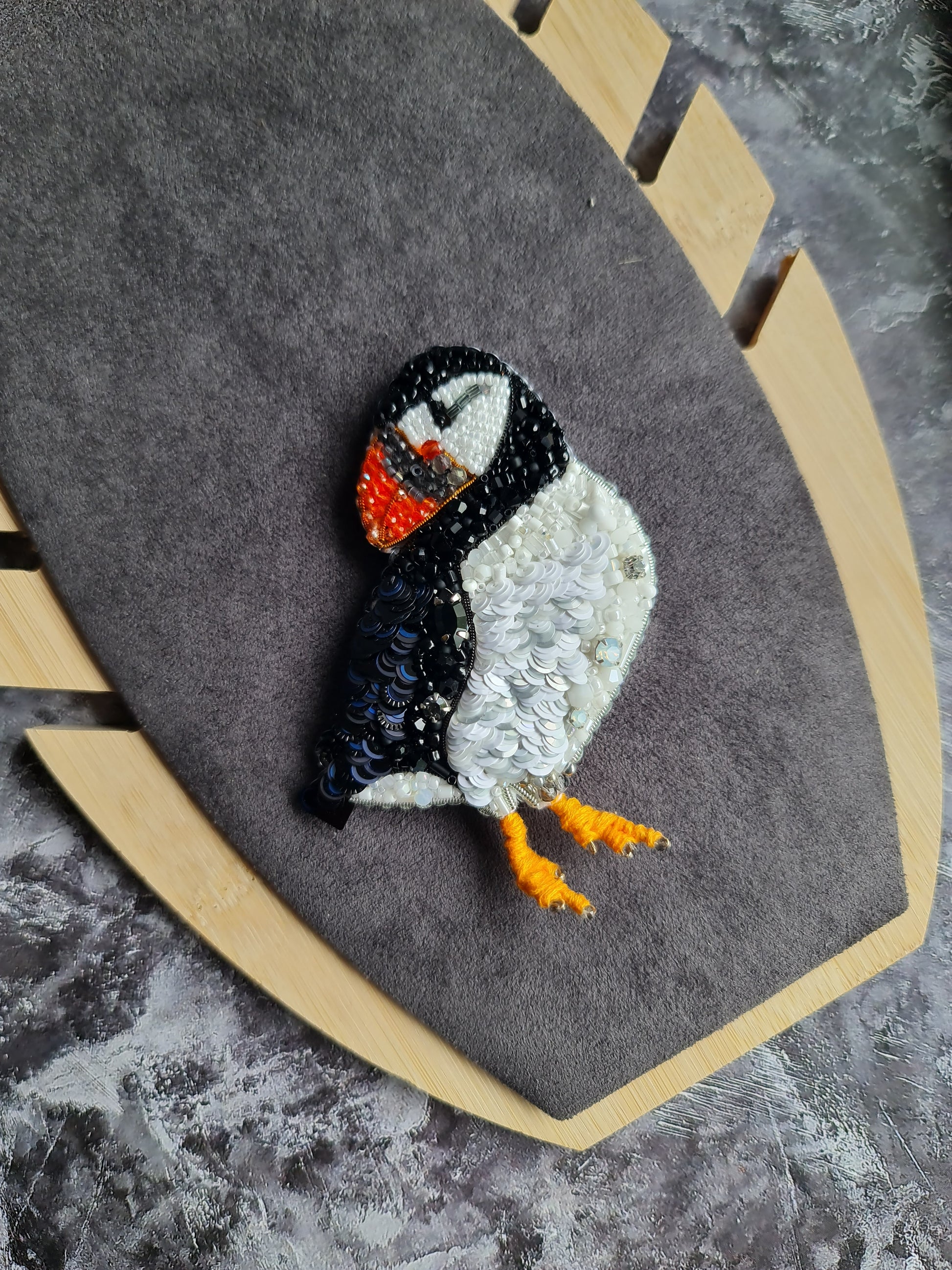 Handmade puffin beaded brooch embroidered with black, white, and orange sequins, beads, and crystals