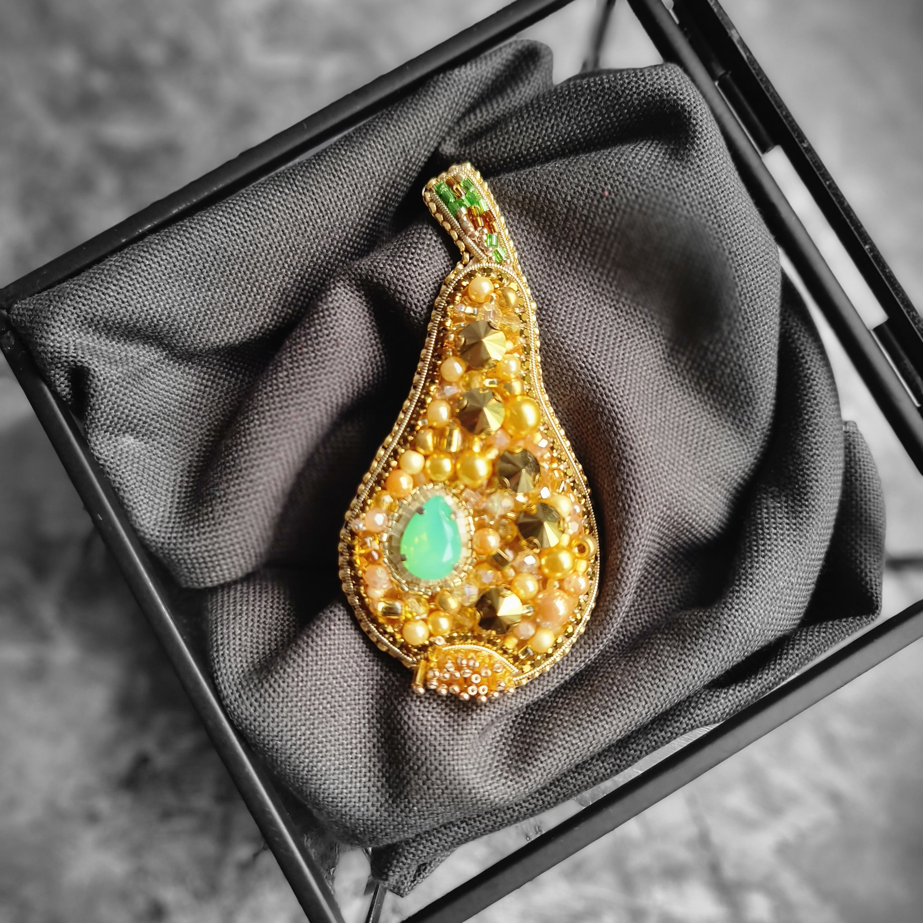 Golden pear beaded brooch hand embroidered with gold beads, pearls, black crystals, and sparkling fruit details