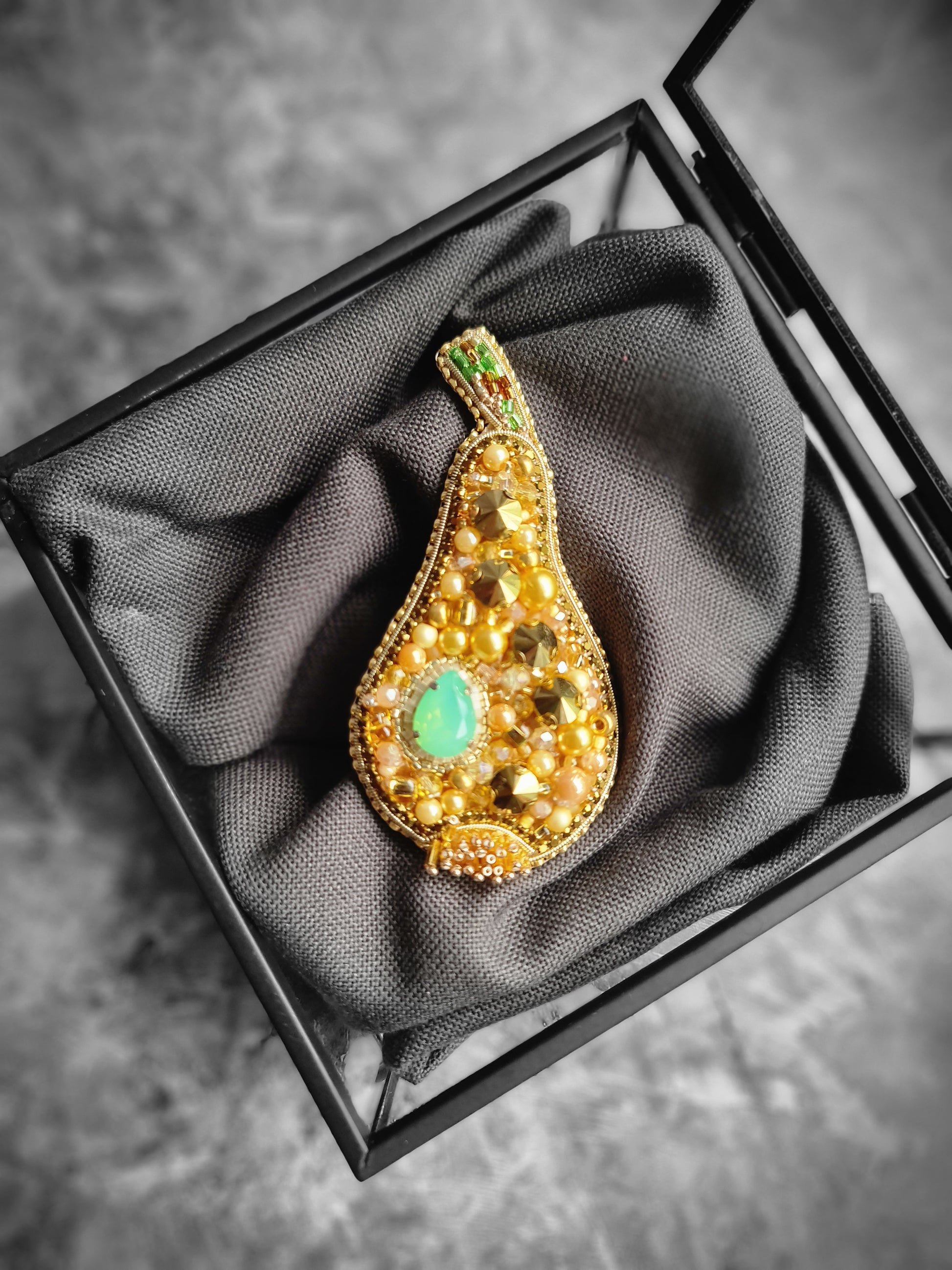 Golden pear beaded brooch hand embroidered with gold beads, pearls, black crystals, and sparkling fruit details