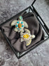 Sea turtle beaded brooch hand embroidered with white beads, pearls, yellow crystals, turquoise accents, and sparkling shell details