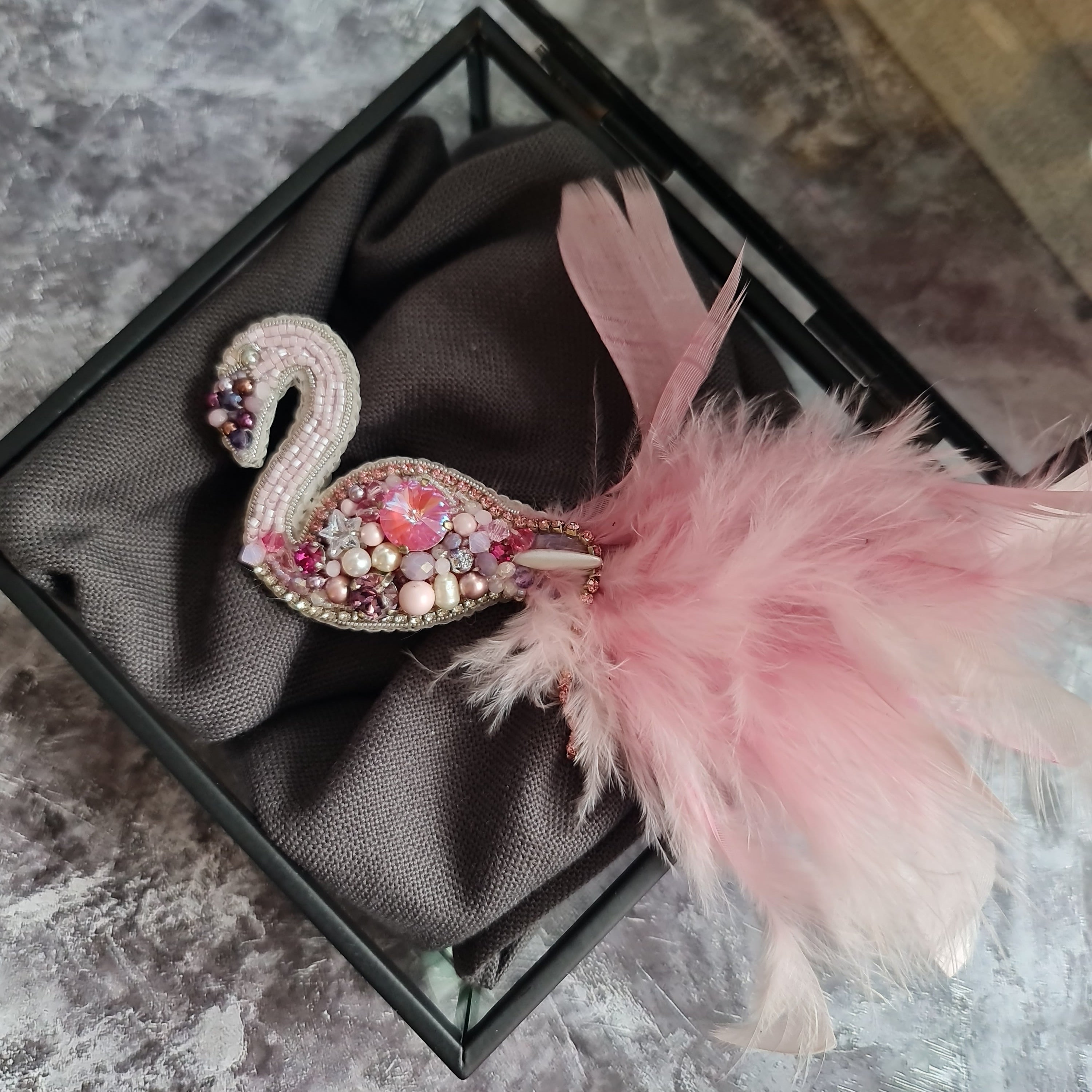 Pink flamingo beaded brooch hand embroidered with pink crystals, beads, soft feathers, and sparkling bird details