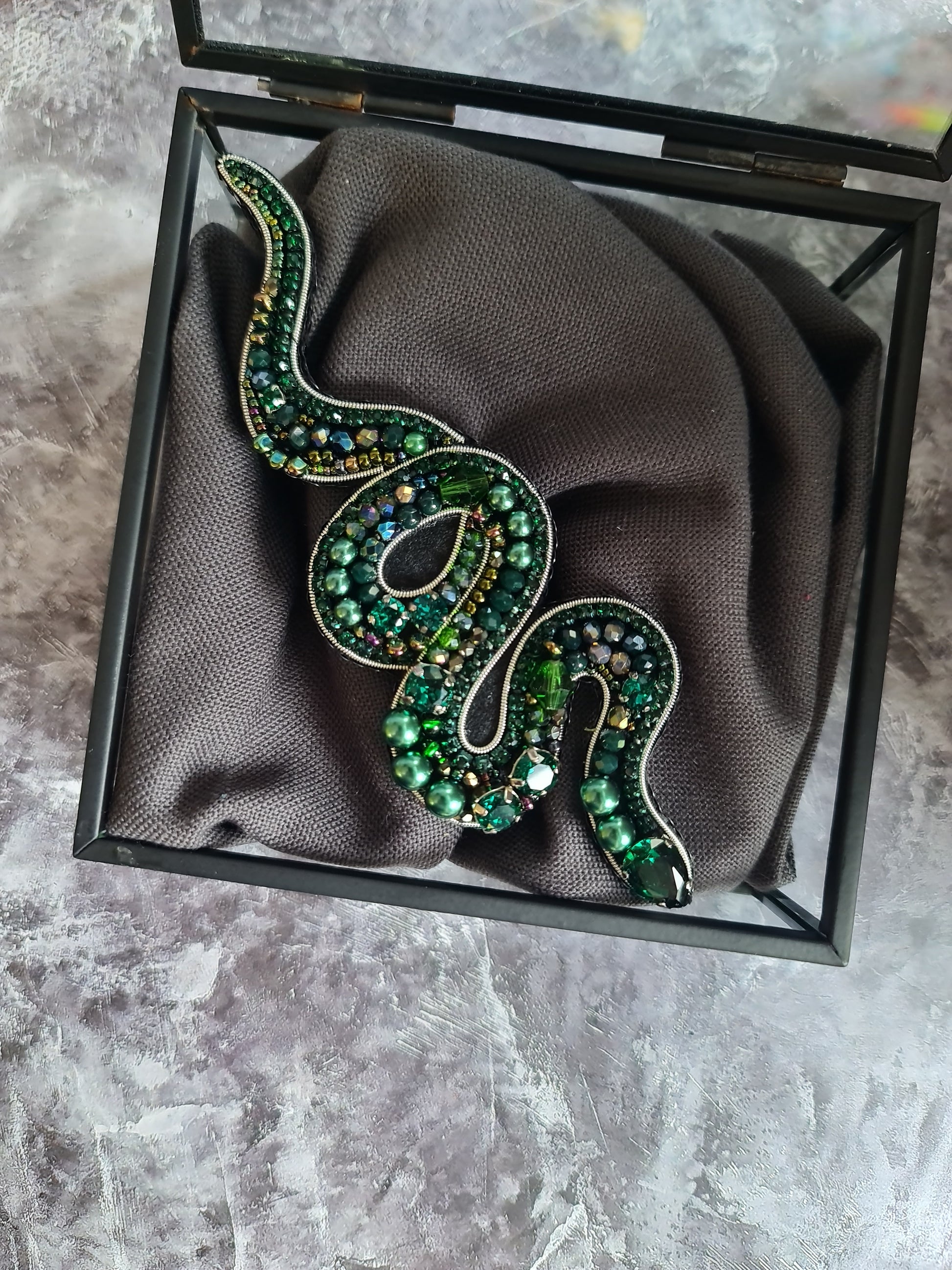 Hand embroidered snake brooch available in gold and emerald with crystals beads and rhinestone details