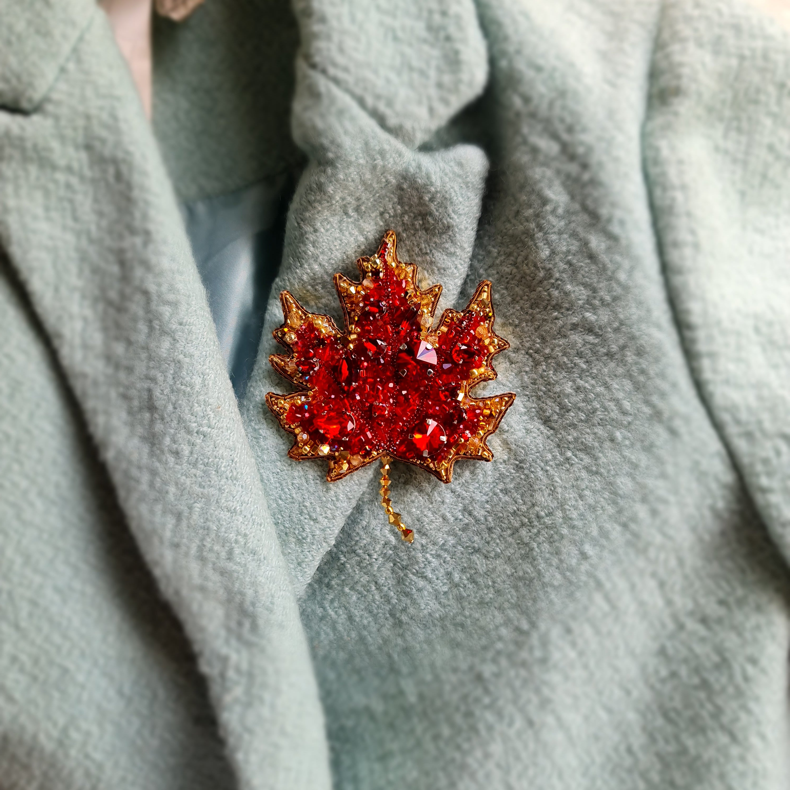 Red maple leaf beaded brooch hand embroidered with crystals and gold details