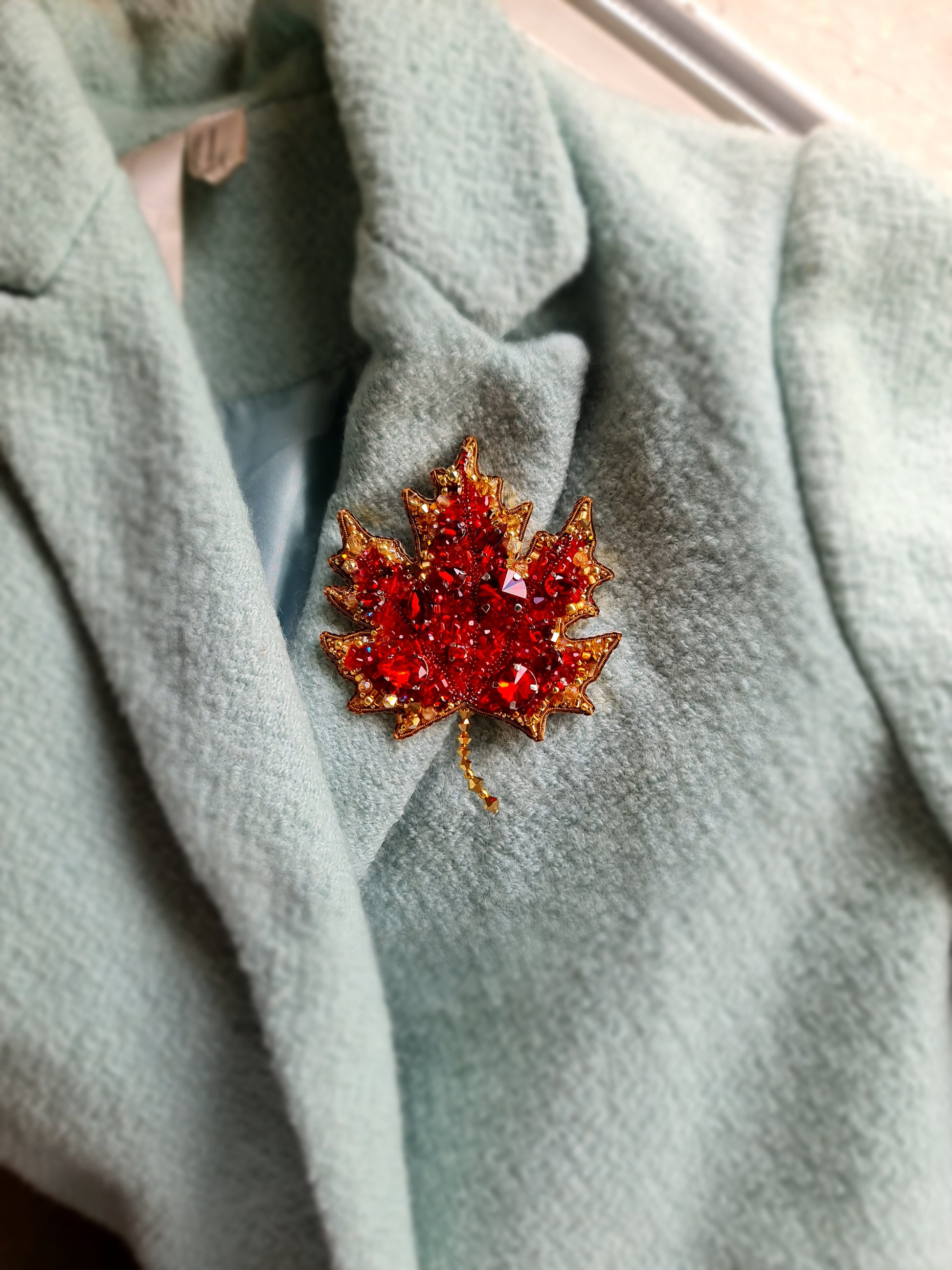 Red maple leaf beaded brooch hand embroidered with crystals and gold details