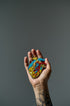 Anatomical Heart Embroidered Brooch featuring intricate handmade embroidery on a unique heart design.