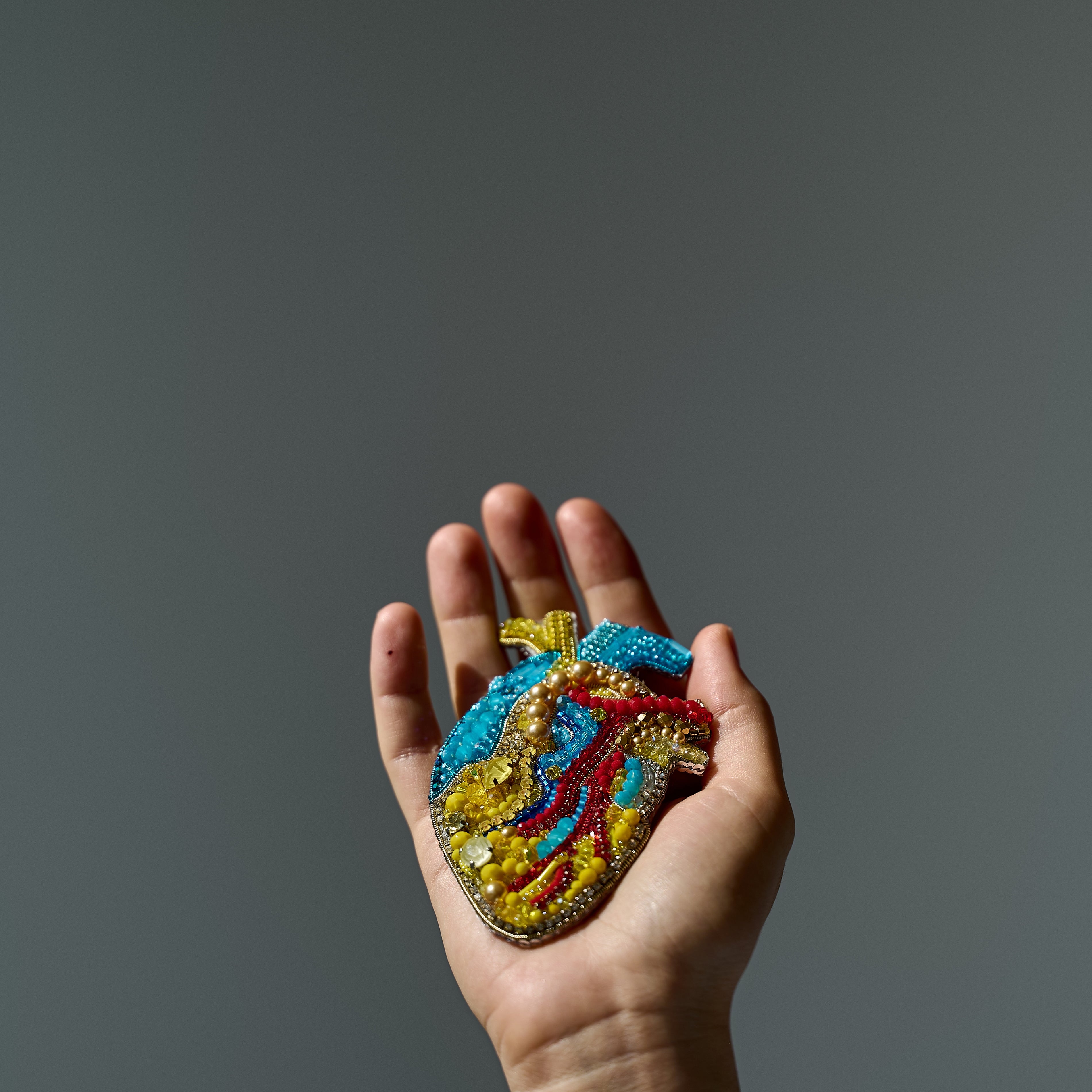 Anatomical Heart Embroidered Brooch featuring intricate handmade embroidery on a unique heart design.