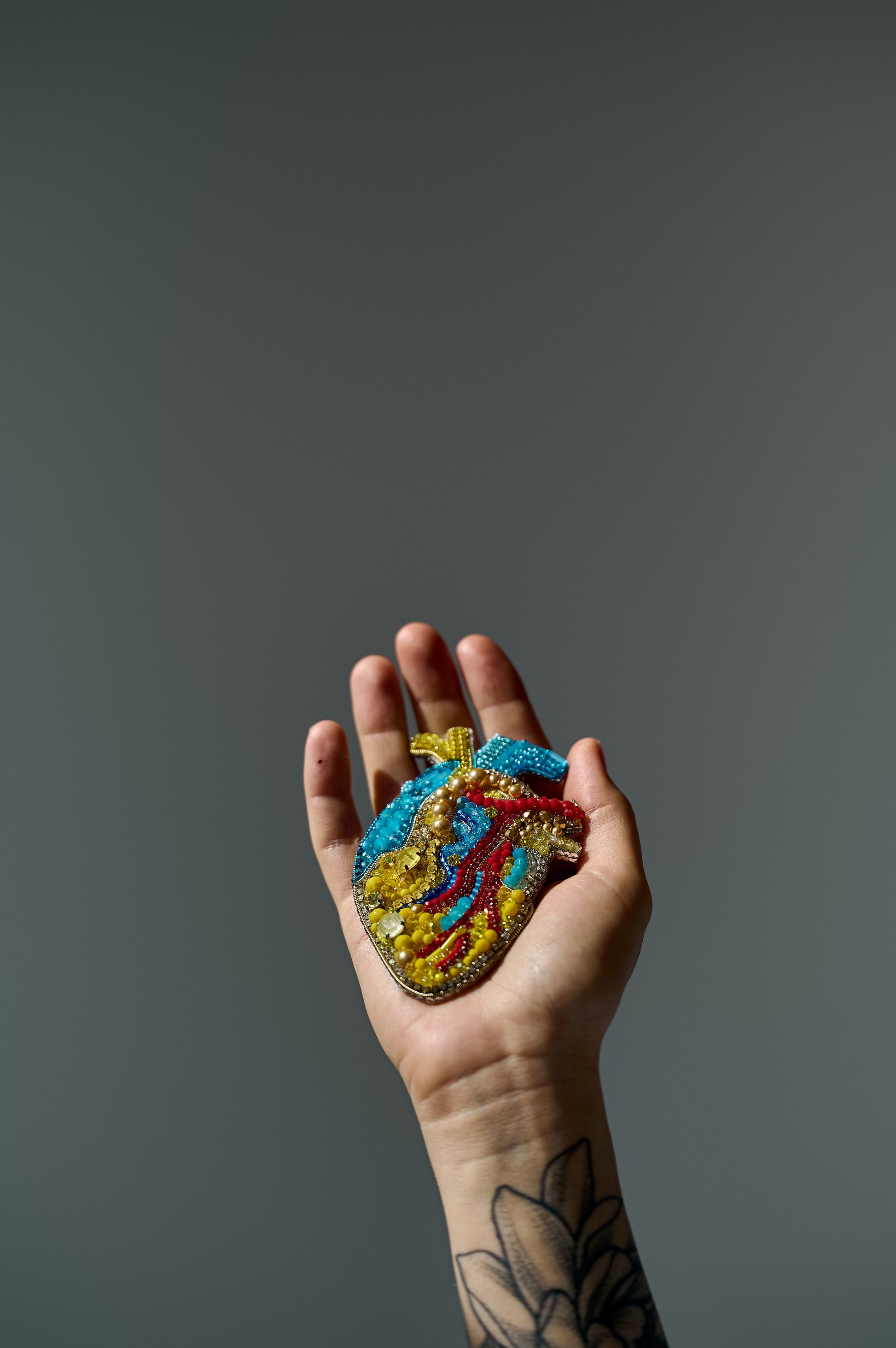Anatomical Heart Embroidered Brooch featuring intricate handmade embroidery on a unique heart design.