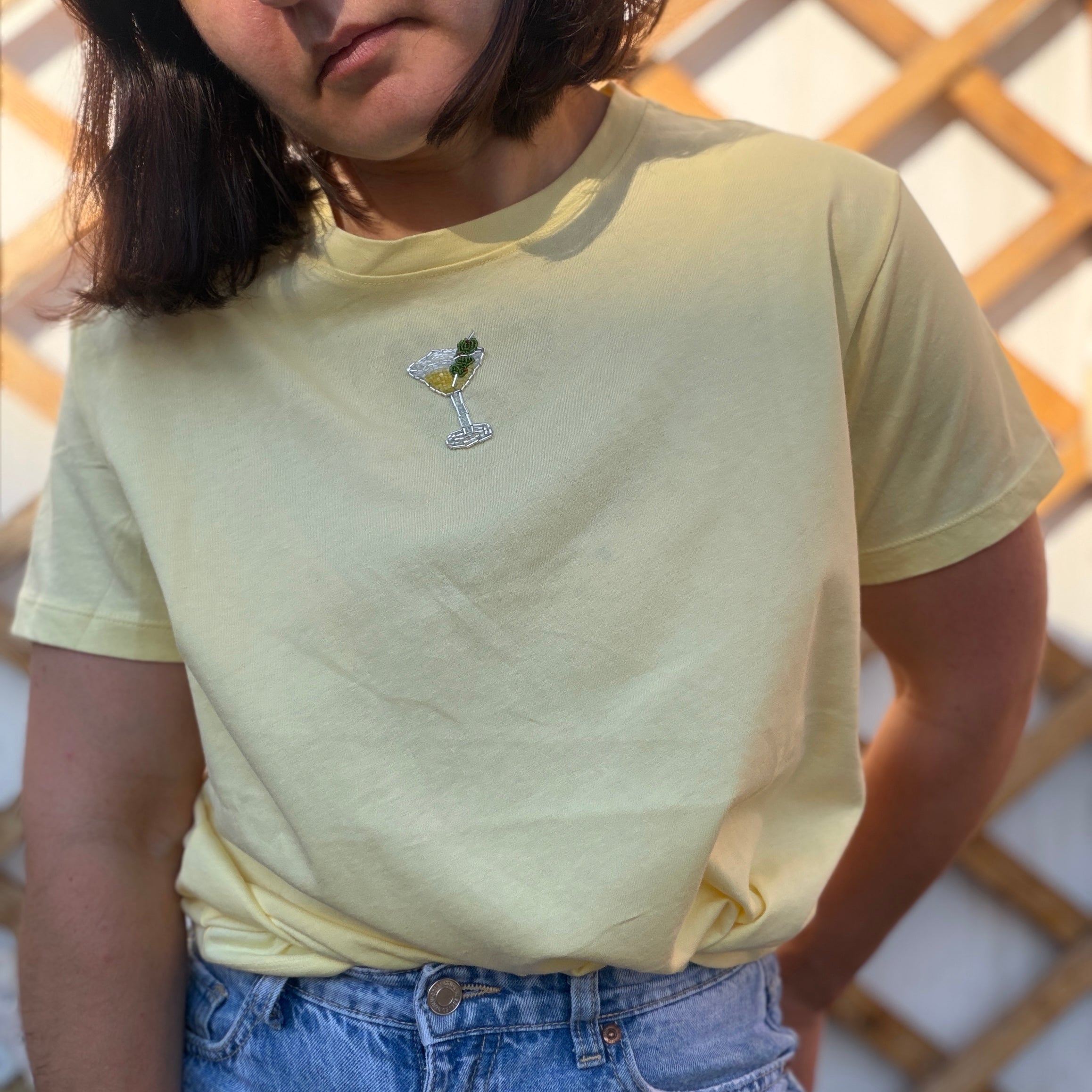 Yellow T-shirt with handmade martini glass embroidery, cocktail-inspired wearable art top