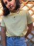 Yellow T-shirt with handmade martini glass embroidery, cocktail-inspired wearable art top