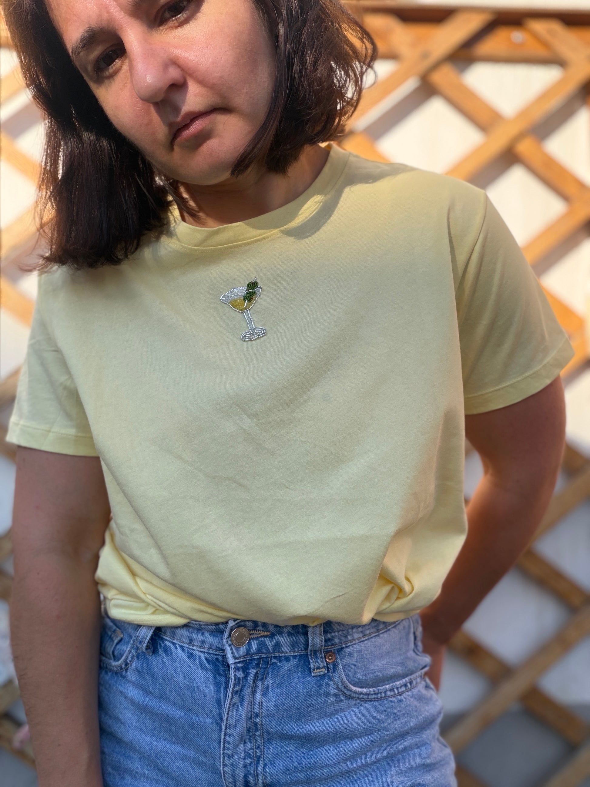 Yellow T-shirt with handmade martini glass embroidery, cocktail-inspired wearable art top