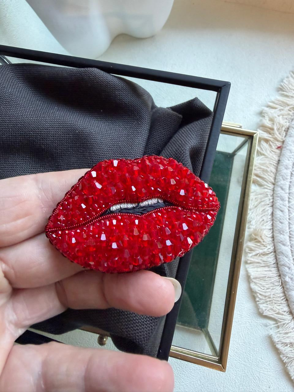 Handmade red lips beaded brooch with sparkling red crystals, closed lips design, statement jewelry accessory.